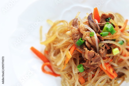 Korean food, glass noodles and beef stir fried vegetable Japchae photo