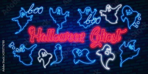 A set of nine neon signs in the form of ghosts. Ghost in neon style on brick background. Night bright advertisement. Can be used for signs, posters, billboards