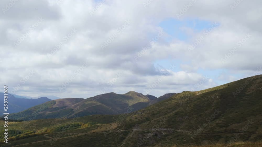 Scenic panoramic view of summer landscape with mountain pastures and beautiful clouds in the sky Scenic panoramic view of summer landscape with mountain pastures and beautiful clouds in the sky