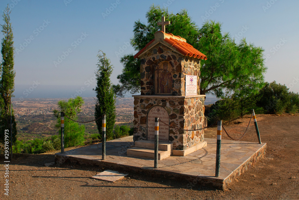 Small building with holy image of St. Helena on view point near the Stavrovouni monastery on Cyprus. With beautiful mountain scenery on the background. Travel in Europe. Religios monument