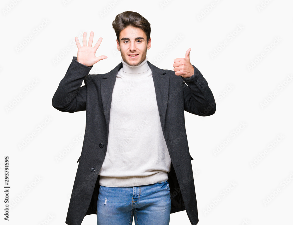 Young elegant man wearing winter coat over isolated background showing and pointing up with fingers number six while smiling confident and happy. Young elegant man wearing winter coat over isolated background showing and pointing up with fingers number six while smiling confident and happy.