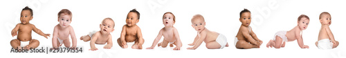 Cute little baby crawling on white background photo