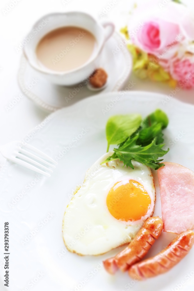 Homemade sausage and sunny side up fried egg with ham Homemade sausage and sunny side up fried egg with ham