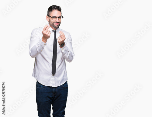 Young handsome business man wearing glasses over isolated background Doing money gesture with hand, asking for salary payment, millionaire business