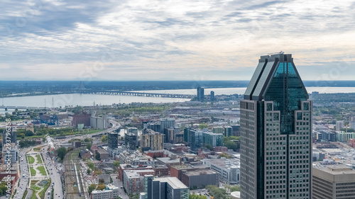 Montreal in Canada, aerial view with the tallest skyscraper and the Saint-Laurent river photo