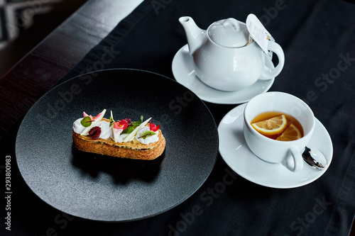 cup of coffee and cake on table