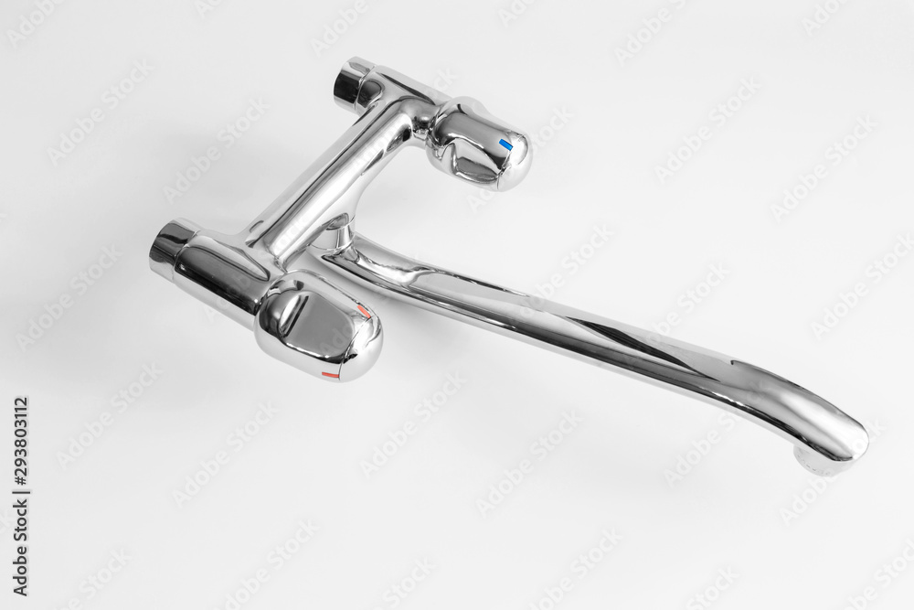 Water mixer. water tap made of chrome material on white background Water mixer. water tap made of chrome material on white background