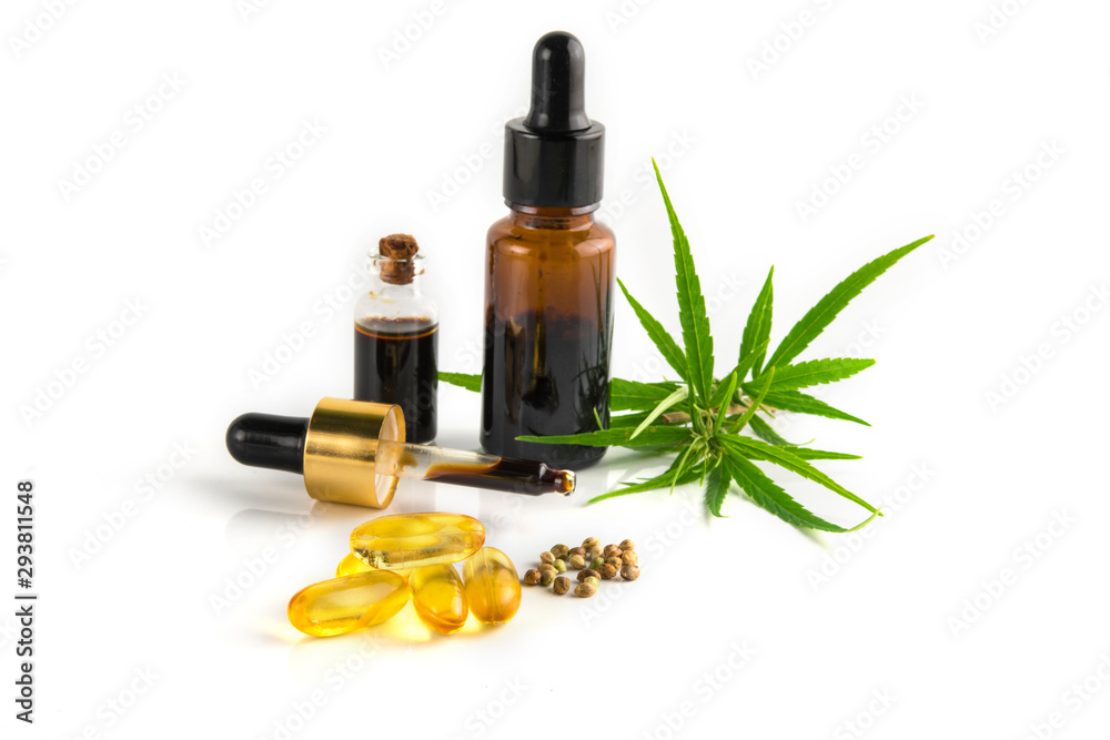 bottle of essential oil with flowers bottle of essential oil with flowers