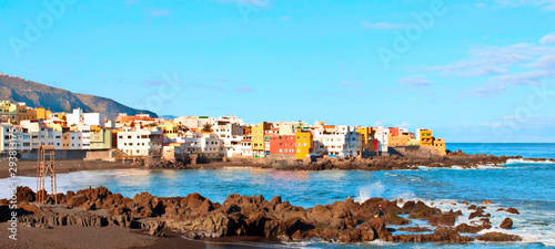 View of a beach with waves in the Spanish town of Puerto de La Cruz in the north of Canary island