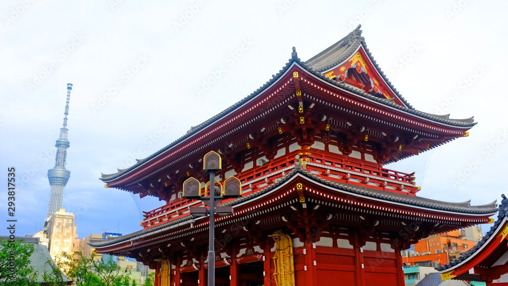 Japan, Tokyo - August 23, 2019: Asakusa Kannon Temple Sensoji Shrine with Tokyo Skytree on a background Japan, Tokyo - August 23, 2019: Asakusa Kannon Temple Sensoji Shrine with Tokyo Skytree on a background