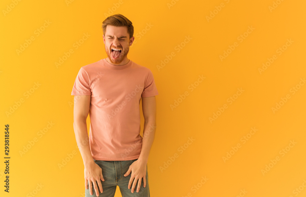 Young redhead man funnny and friendly showing tongue Young redhead man funnny and friendly showing tongue
