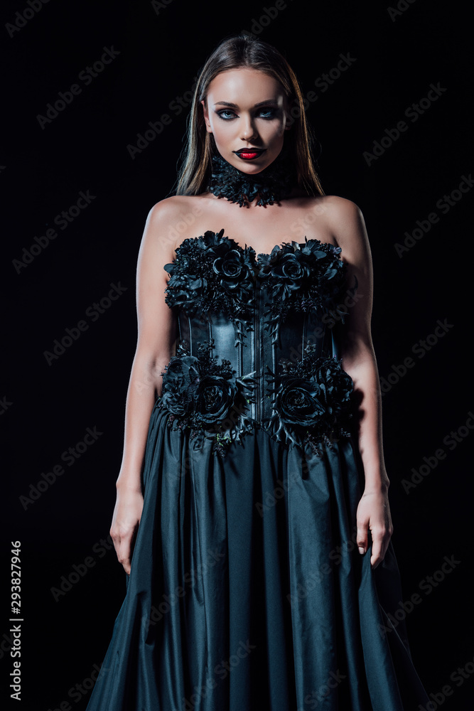 scary vampire girl in black gothic dress isolated on black scary vampire girl in black gothic dress isolated on black
