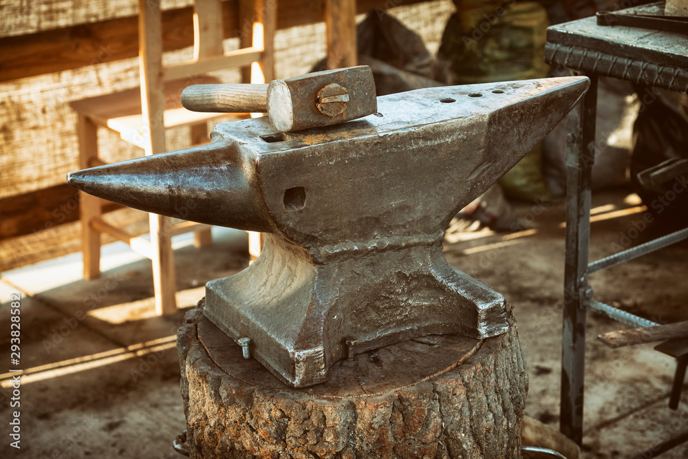 Anvil And Hammer Inside A Blacksmith Workshop Anvil And Hammer Inside A Blacksmith Workshop