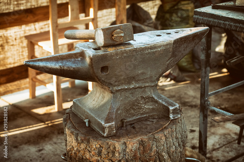 Anvil And Hammer Inside A Blacksmith Workshop