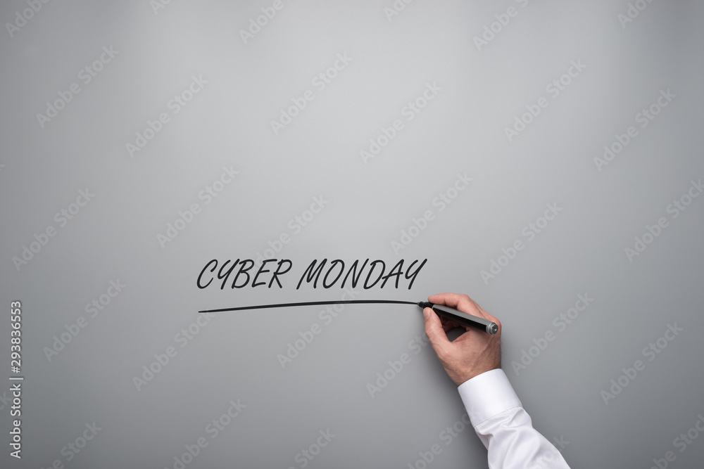 Fototapeta Męska ręka pisze Cyber Poniedziałku znaku