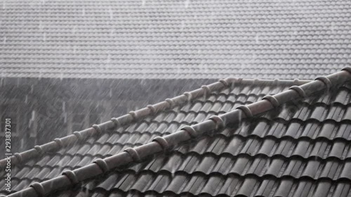 Rainy Day Concept. Rain Falling into the Roof. Static and Handheld