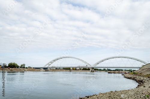 Novi Sad, Serbia - July 17. 2019: Zezelj bridge on river Danube in Novi Sad Serbia. The prospect of built New Zezelj Bridge viewed from the Petrovaradin side of the promenade