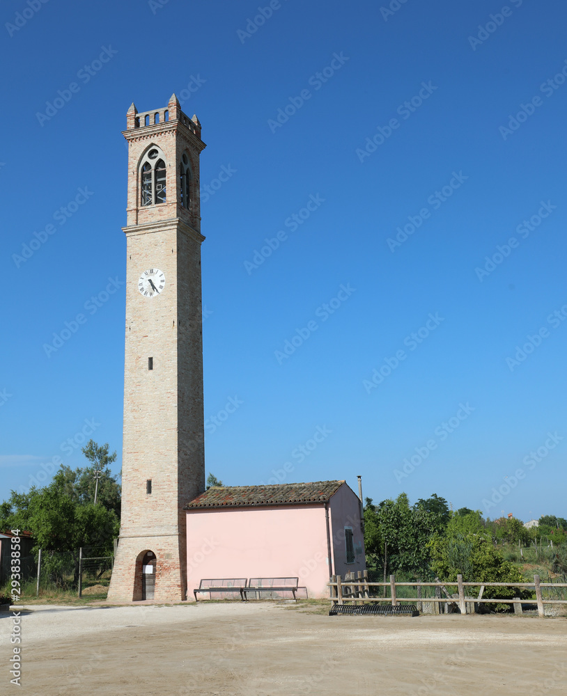High bell tower on the town square of Lio Piccoli a small villag