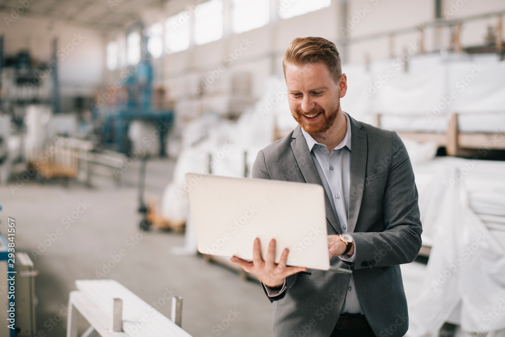 Manager checks machines at the factory. Inspector checks a factory. Manager checks machines at the factory. Inspector checks a factory.