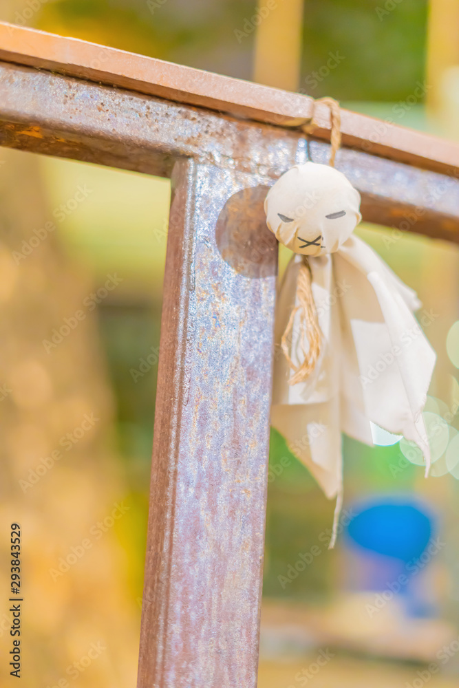 A rainy doll hanging on the clothesline A rainy doll hanging on the clothesline