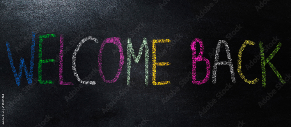 handwriting with colorful chalk welcome back concept
