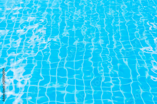 surface of blue water in swimming pool, background of blue water  © chocobluesky19