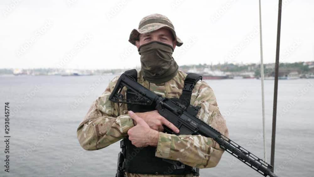 Special force unit on the board of vessel, holding M16 rifle. Special force unit on the board of vessel, holding M16 rifle.