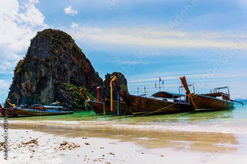 longtail boat on tropical beach in thailand