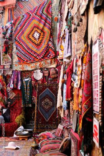  Traditional colorful rugs and carpets are decorated orientally in a carpet store in Cappadocia Turkey.