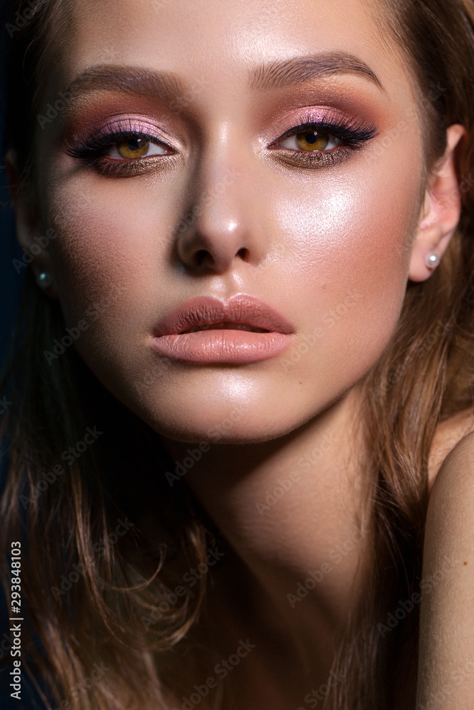 Close up portrait of beautiful young woman with professional makeup, perfect skin, colorful eyeshadows. - obrazy, fototapety, plakaty 