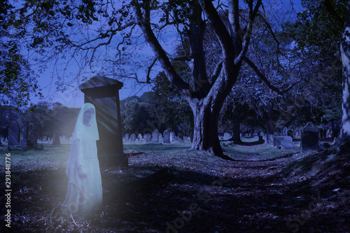 Konstfotografi Ghosts appear during Halloween at the Church Cemetery - Transparent blue white V