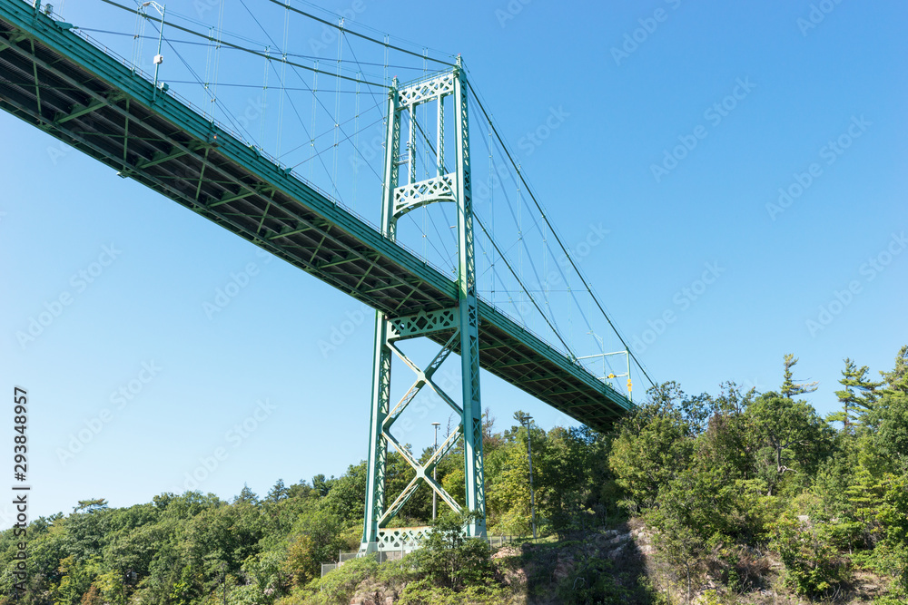 Detail of the Thousand Islands Bridge across St. Lawrence River. This bridge connects New York State in USA and Ontario in Canada Detail of the Thousand Islands Bridge across St. Lawrence River. This bridge connects New York State in USA and Ontario in Canada