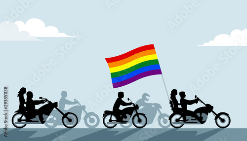 Bikers on motorcycles with lgbt flag