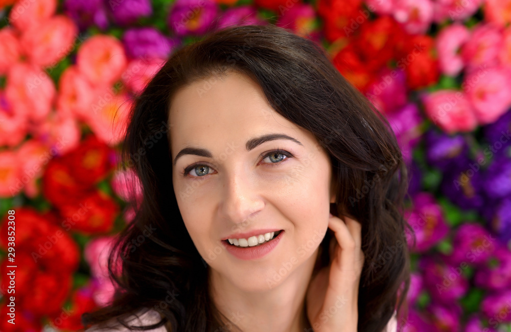 Close-up portrait of an adult pretty brunette woman on color background in studio. Beauty, Art, model posing. Close-up portrait of an adult pretty brunette woman on color background in studio. Beauty, Art, model posing.