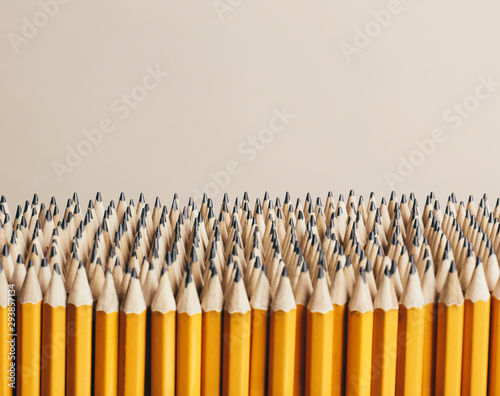 Close up of large grouping of sharpened graphite pencils