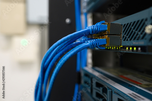 Network device front panel with utp cables connected in data center room