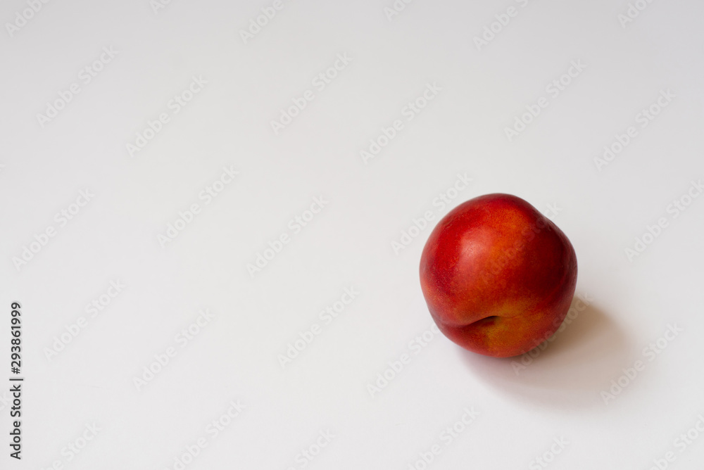 Fresh organic nectarine on white background Fresh organic nectarine on white background