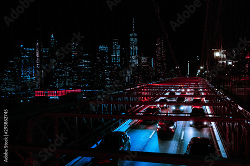 the brooklyn bridge illuminated at night