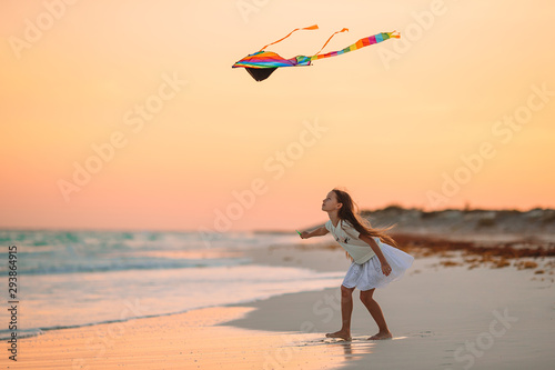 Cute little girl at beach during summer vacation