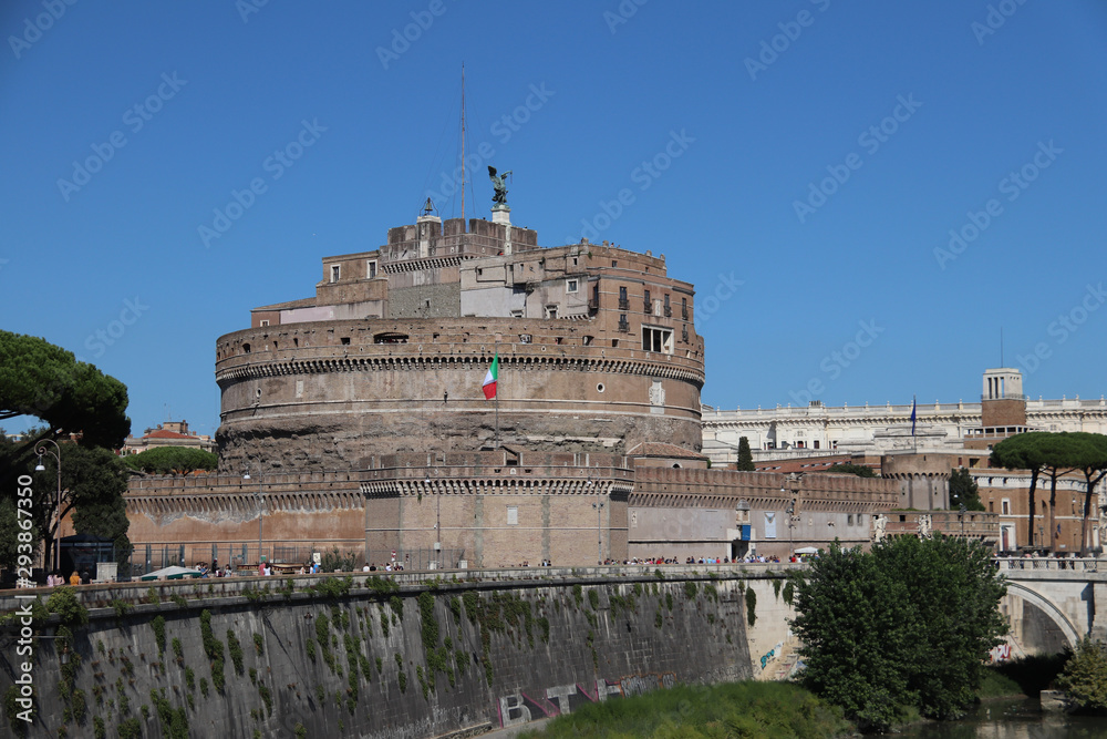 Mausoleum Castel Sant Angelo and bridge reflecting on the water surface