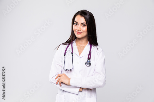 Beautiful young doctor with stethoscope isolated on white background