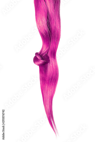 Pink hair knot isolated on white background. Long straight ponytail