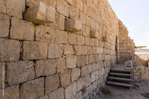 Fototapeta Naklejka Na Ścianę i Meble -  The  outer wall of the Roman baths on the territory ruins of the Nabataean city of Avdat, located on the incense road in the Judean desert in Israel. It is included in the UNESCO World Heritage List.