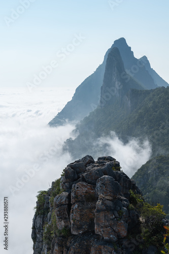 Cloud and foggy mountain peak and cliff during a moody summer morning in Monterrey Mexico