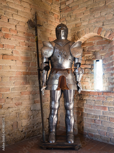 Knight in medieval armor with battle axe