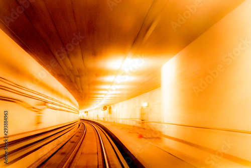 Obraz na płótnie Abstract image of motion blurred tracks and subway tunnel in Copenhagen, Denmark. w salonie