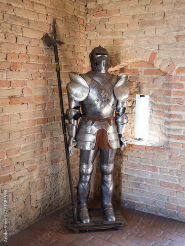 Knight in medieval armor with battle axe