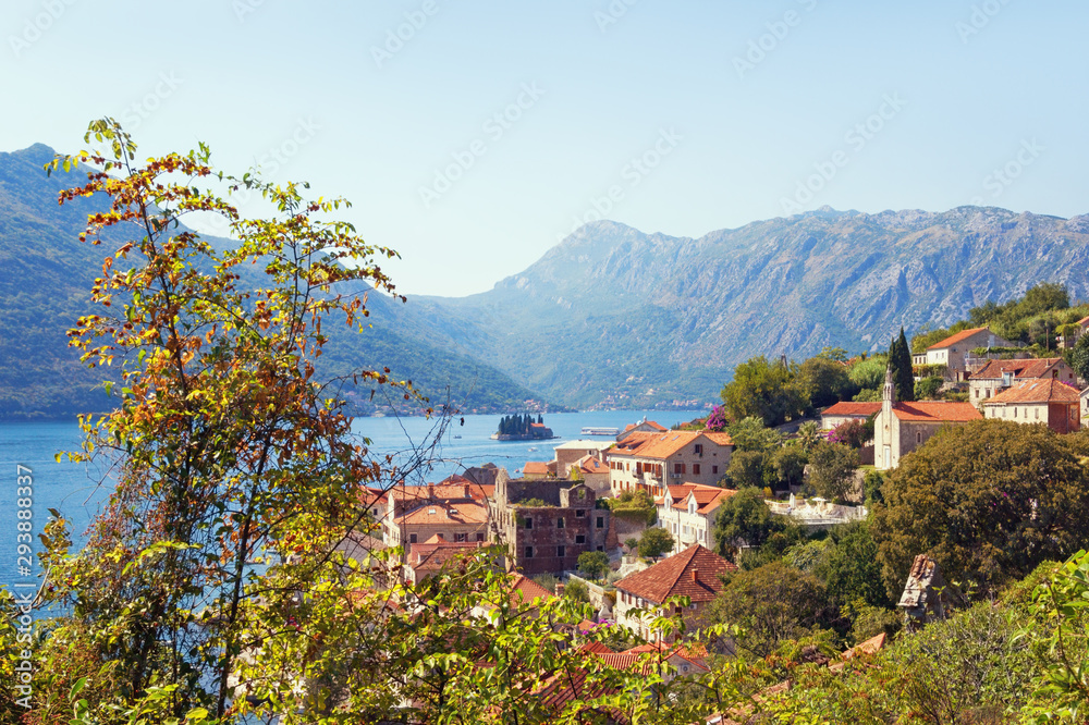 Beautiful autumn Mediterranean landscape. Montenegro, Adriatic Sea, Bay of Kotor. View of Perast town and Island of Saint George. Travel and tourism concept