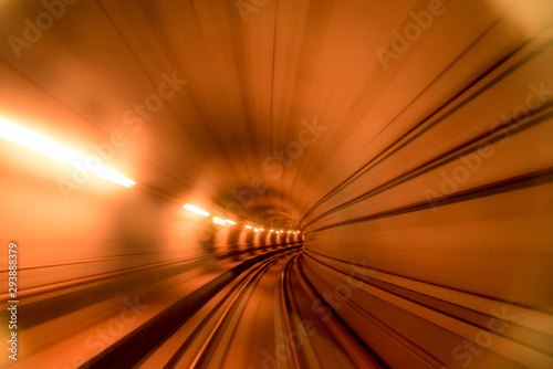 Abstract image of motion blurred tracks and subway tunnel in Copenhagen, Denmark.