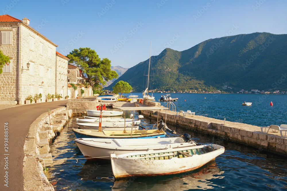 Sunny autumn day in ancient town of Perast. Montenegro, Adriatic Sea, Bay of Kotor